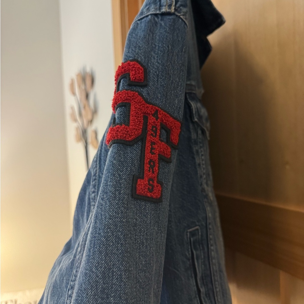 Team Apparel Blue Denim Jacket with Red Embroidered Patches - Picture 3 of 4
